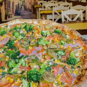 Tajemnica wyjątkowego ciasta w Pizzerii Pełen Brzuszek w Łodzi