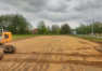 Przygotowanie działki pod budowę obiektu z użyciem koparki gąsienicowej